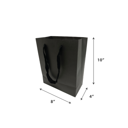 Matte black gift bag with soft black rope handles, sized 10" x 8" x 4".