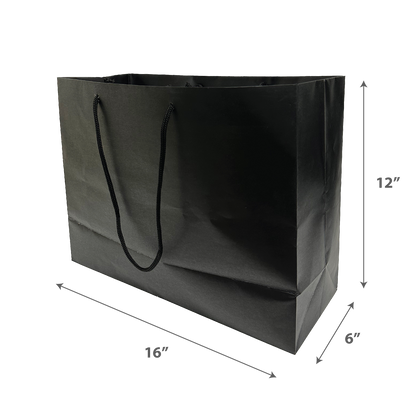 Black paper shopping bag with rope handles, displayed on a transparent background. Dimensions shown are 16 inches wide, 12 inches tall, and 6 inches deep.