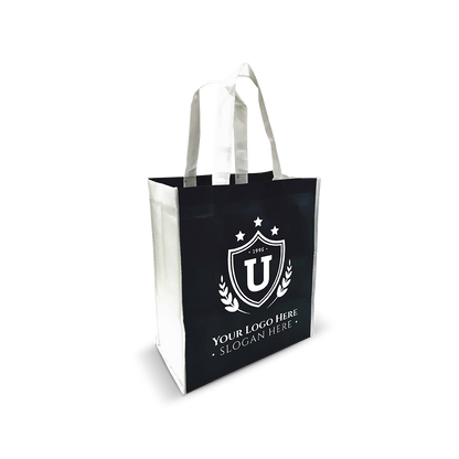 Black promotional tote bag with white handles and custom crest logo